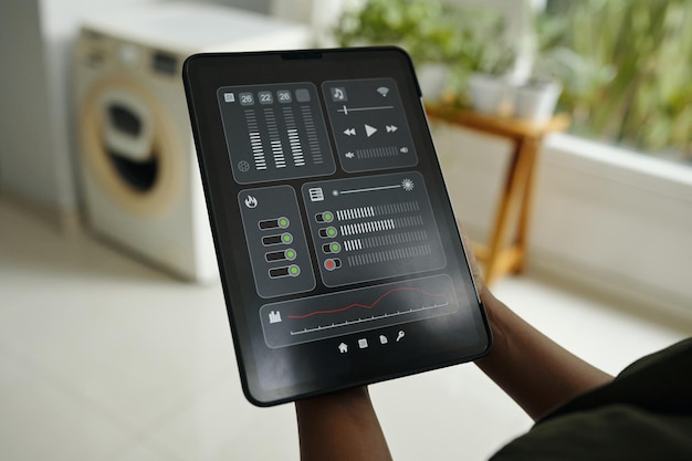 A user interface of KineMaster on a tablet, displaying multiple video layers, audio tracks, and various editing tools. The image focuses on the timeline and advanced settings, indicating the app's professional-level capabilities.