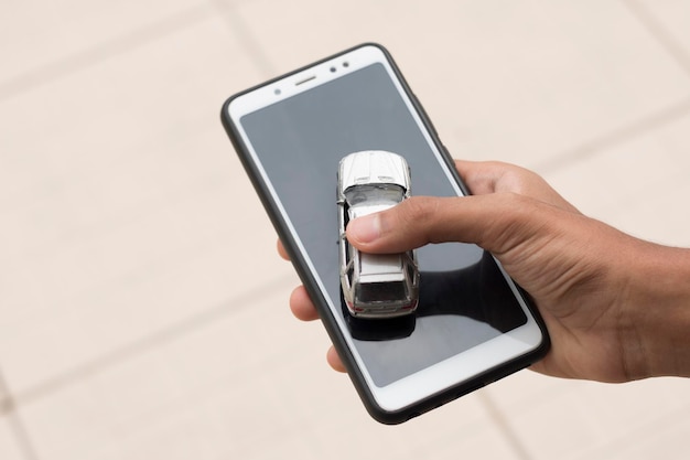 A close-up shot of a person's hand holding a smartphone, with a ride-sharing app open displaying various subscription plans with different price points and included benefits. The focus is on the details of the subscription options, emphasizing the cost savings and convenience.