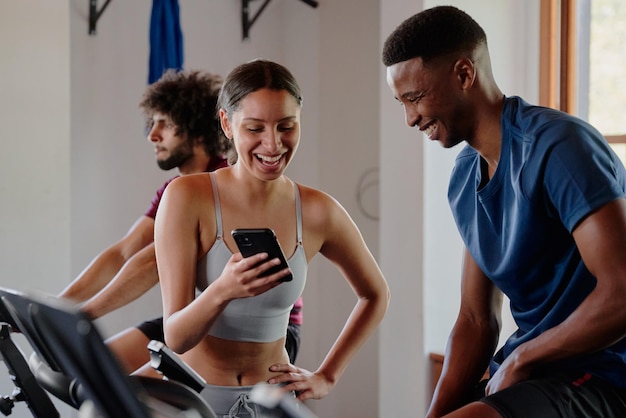 A split image showing a crowded gym on one side and a person happily exercising at home with a fitness app on the other, symbolizing cost savings.