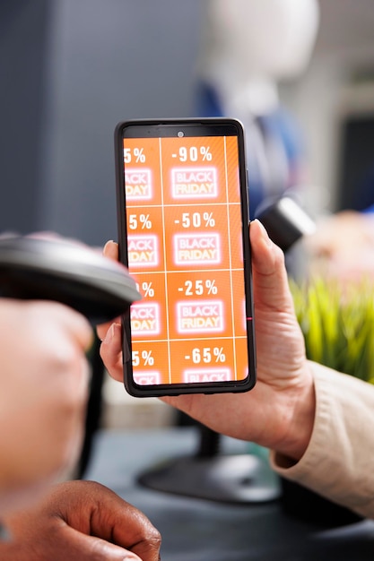 A close-up of a smartphone screen showing the Rappi app interface, specifically the delivery fee breakdown before confirming an order. The screen also displays available discounts and promotional offers.