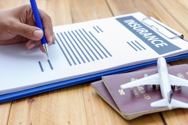 A close-up shot of a travel insurance policy document, highlighting key sections such as 