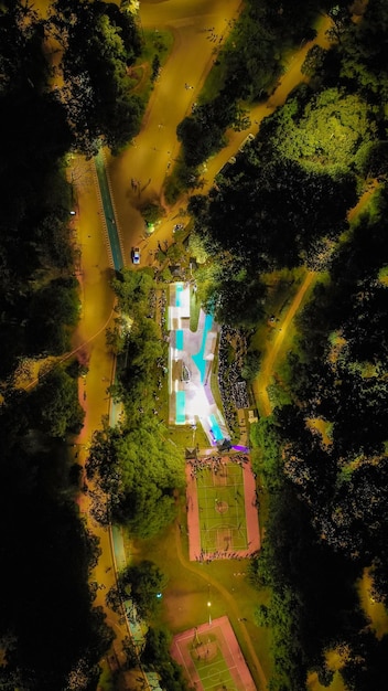 An aerial view of Hotel Fazenda Dona Carolina in Itatiba, Brazil, showing the vast expanse of the property with its colonial-style buildings, swimming pools, green landscapes, and serene surroundings, capturing the essence of luxury and relaxation.